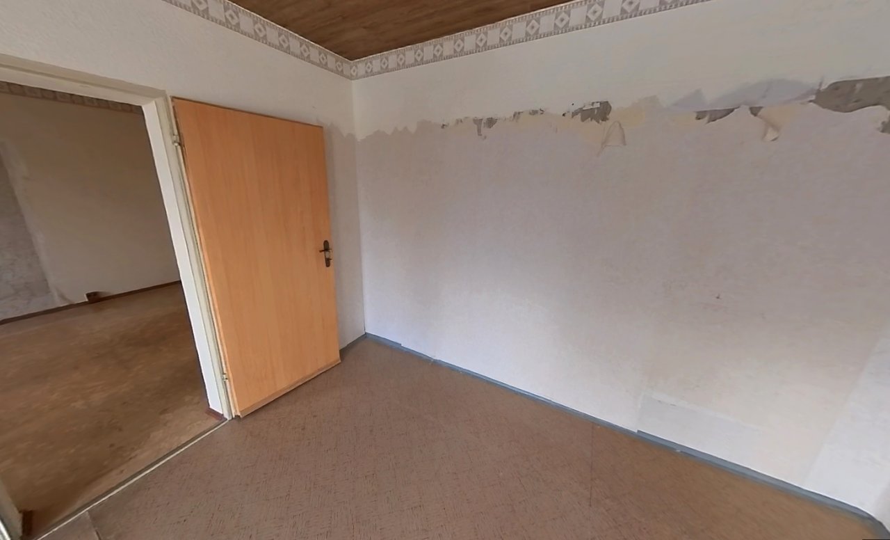 Schlafzimmer mit Durchgang zum Wohnzimmer Schlafzimmer mit Durchgang zum Wohnzimmer